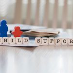 Word,Child,Support,Composed,Of,Wooden,Letters.,Closeup