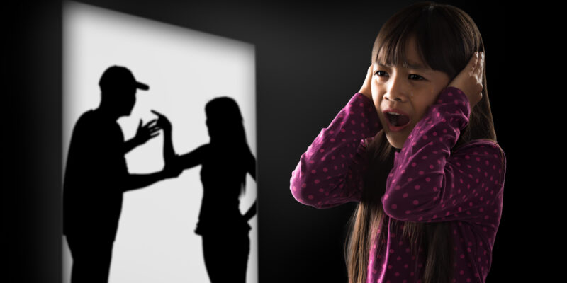 Crying,Illtle,Asian,Girl,With,Her,Fighting,Parents,In,The