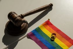 Legalization,Of,Same-sex,Marriages.,Rainbow,Flag,Wedding,Rings,And,Judge's